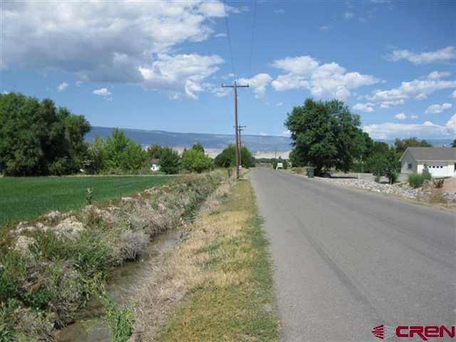 Tbd Tbd 1725th Road Delta, CO 81416 - Photo 2 of 13 a view of a road with a yard