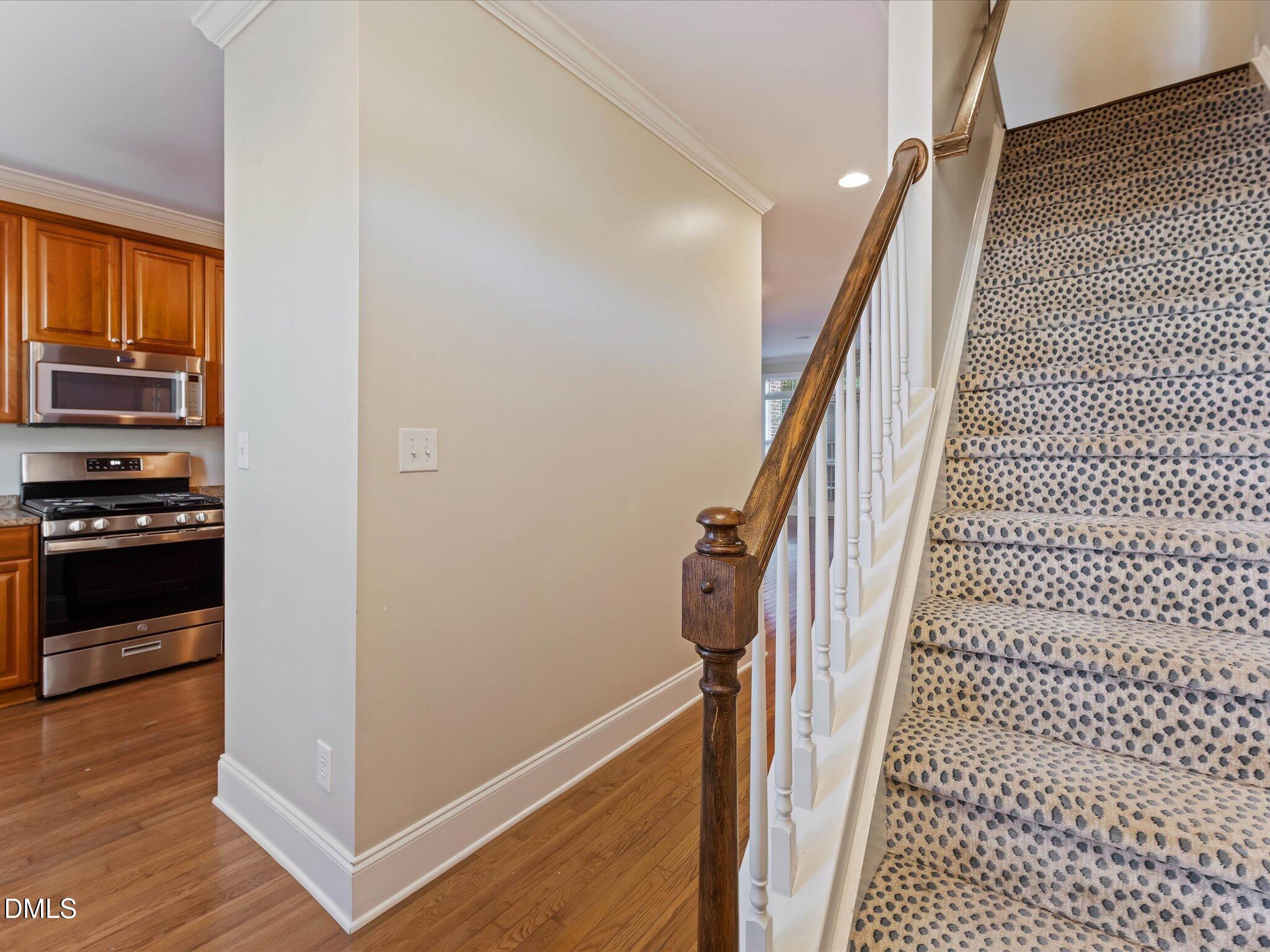 606 Highpark Lane Raleigh, NC 27608 - Photo 8 of 27 a view of a kitchen from a corridor