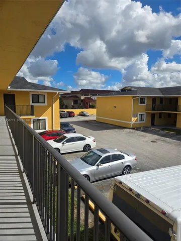 a view of a terrace with seating area