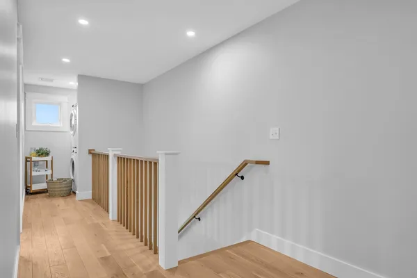 a view of a hallway with staircase