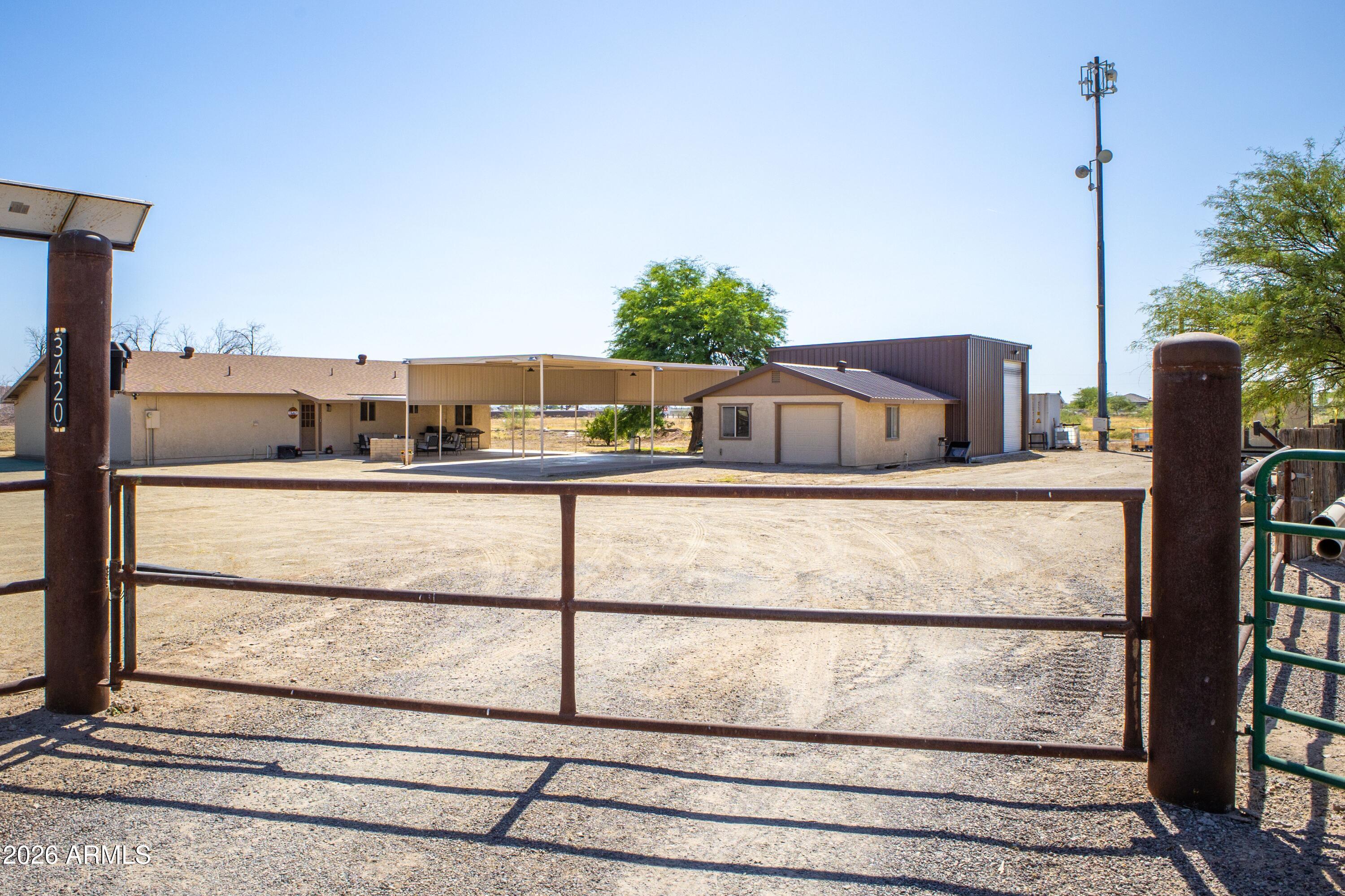 3420 South Watson Road Buckeye, AZ 85326 - Photo 2 of 36 Front Gate RS