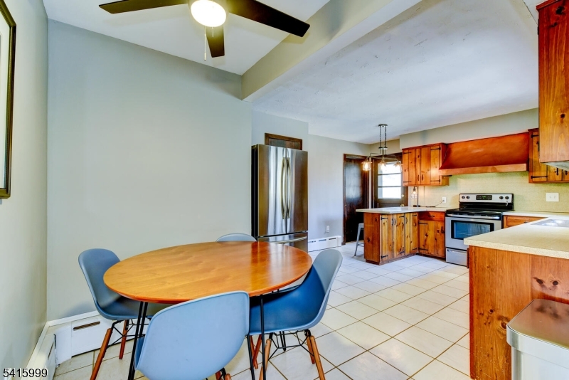 95 Dreahook Road Lebanon, NJ 08833 - Photo 11 of 30 a view of a kitchen with kitchen island a sink and a refrigerator