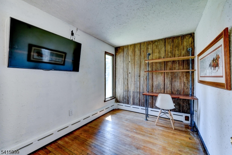 95 Dreahook Road Lebanon, NJ 08833 - Photo 14 of 30 a living room with furniture and a flat screen tv
