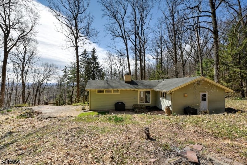 95 Dreahook Road Lebanon, NJ 08833 - Photo 23 of 30 a view of house with a yard covered with snow