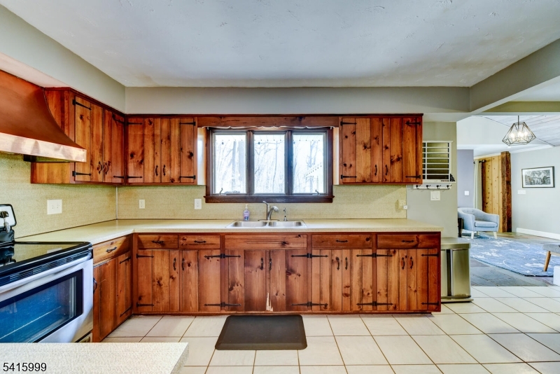 95 Dreahook Road Lebanon, NJ 08833 - Photo 9 of 30 a kitchen with a sink stove and cabinets