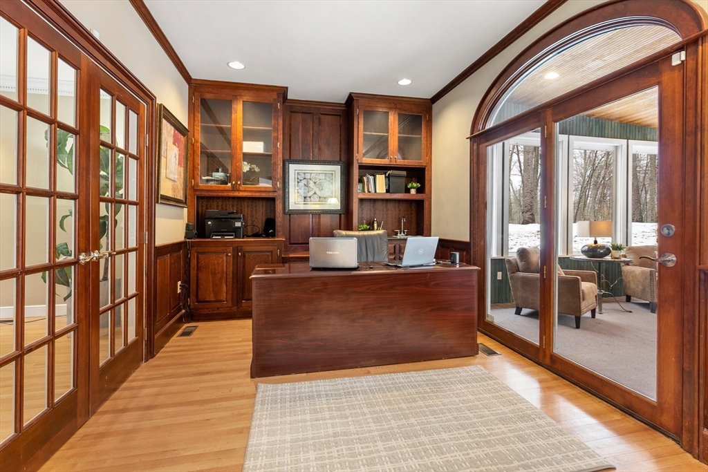 84 Phillips Road Sudbury, MA 01776 - Photo 11 of 34 a living room with furniture a large window and flat screen tv