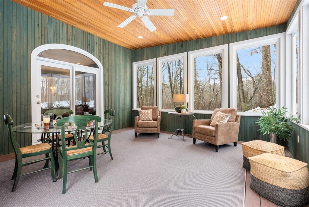 84 Phillips Road Sudbury, MA 01776 - Photo 12 of 34 a living room with furniture and a large window