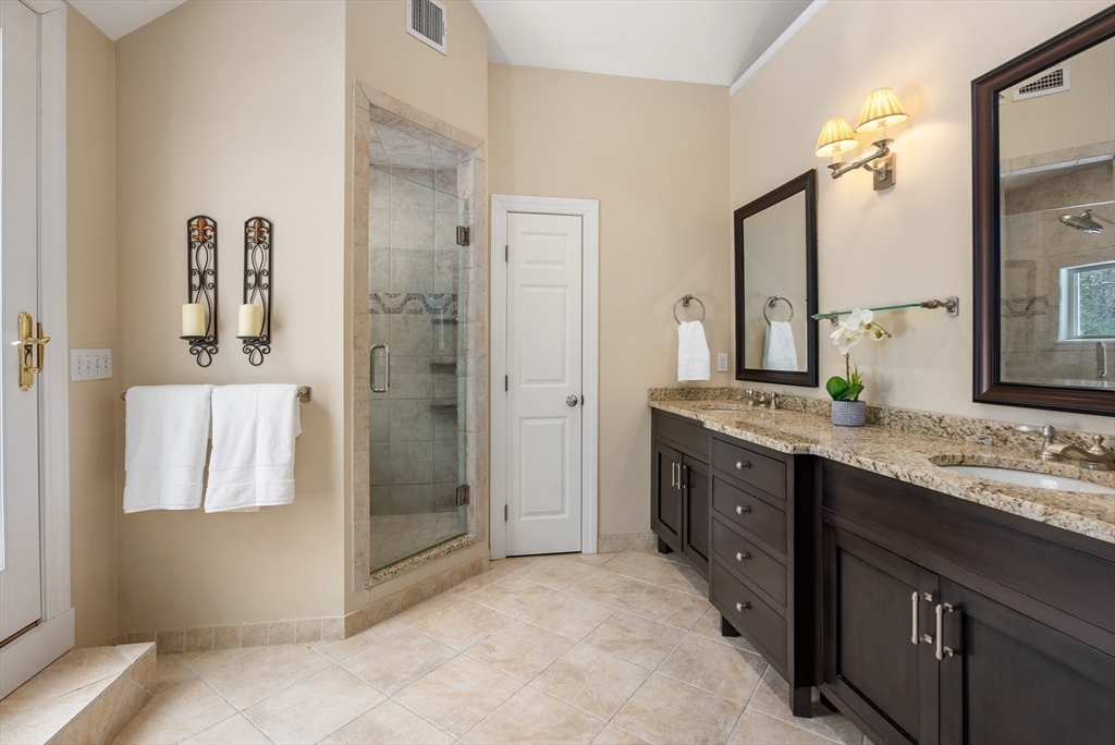 84 Phillips Road Sudbury, MA 01776 - Photo 17 of 34 a bathroom with a granite countertop sink and a mirror