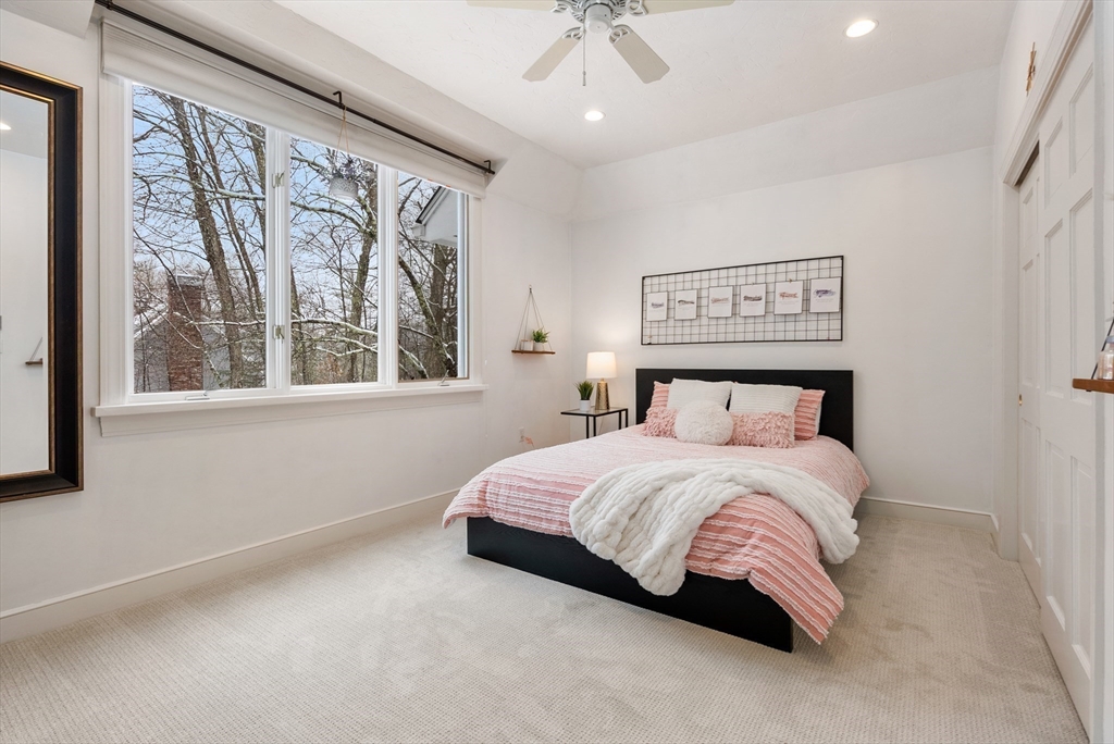 84 Phillips Road Sudbury, MA 01776 - Photo 20 of 34 a bedroom with a large bed and a window
