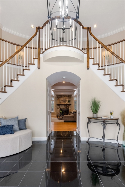 84 Phillips Road Sudbury, MA 01776 - Photo 2 of 34 a living room with furniture fireplace and a rug