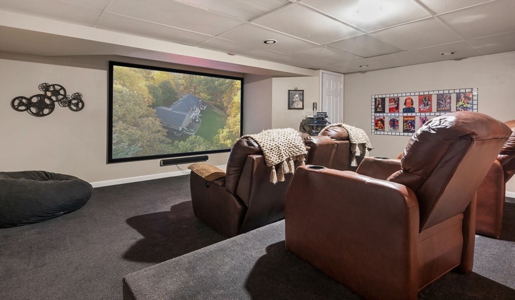 84 Phillips Road Sudbury, MA 01776 - Photo 28 of 34 a living room with furniture and a window