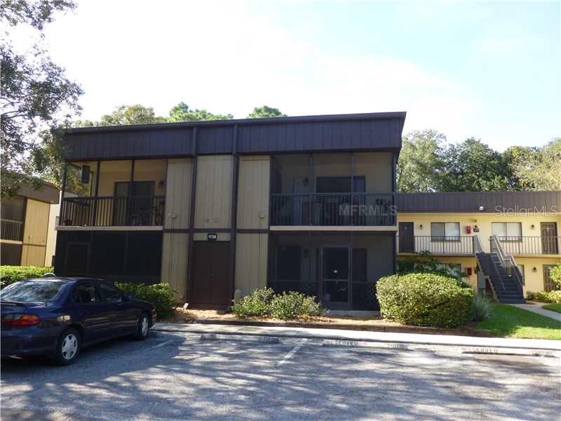 11808 Raintree Lake Lane, Unit D Temple Terrace, FL 33617 - Photo 1 of 1 QUIET AREA WITH MATURE TREES, ASSIGNED PARKING AND SCREENED BALCONY.