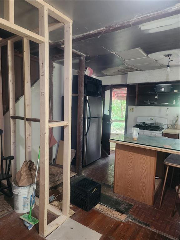 313 Linton Street McKees Rocks, PA 15136 - Photo 8 of 21 a kitchen with stainless steel appliances granite countertop a refrigerator and a sink