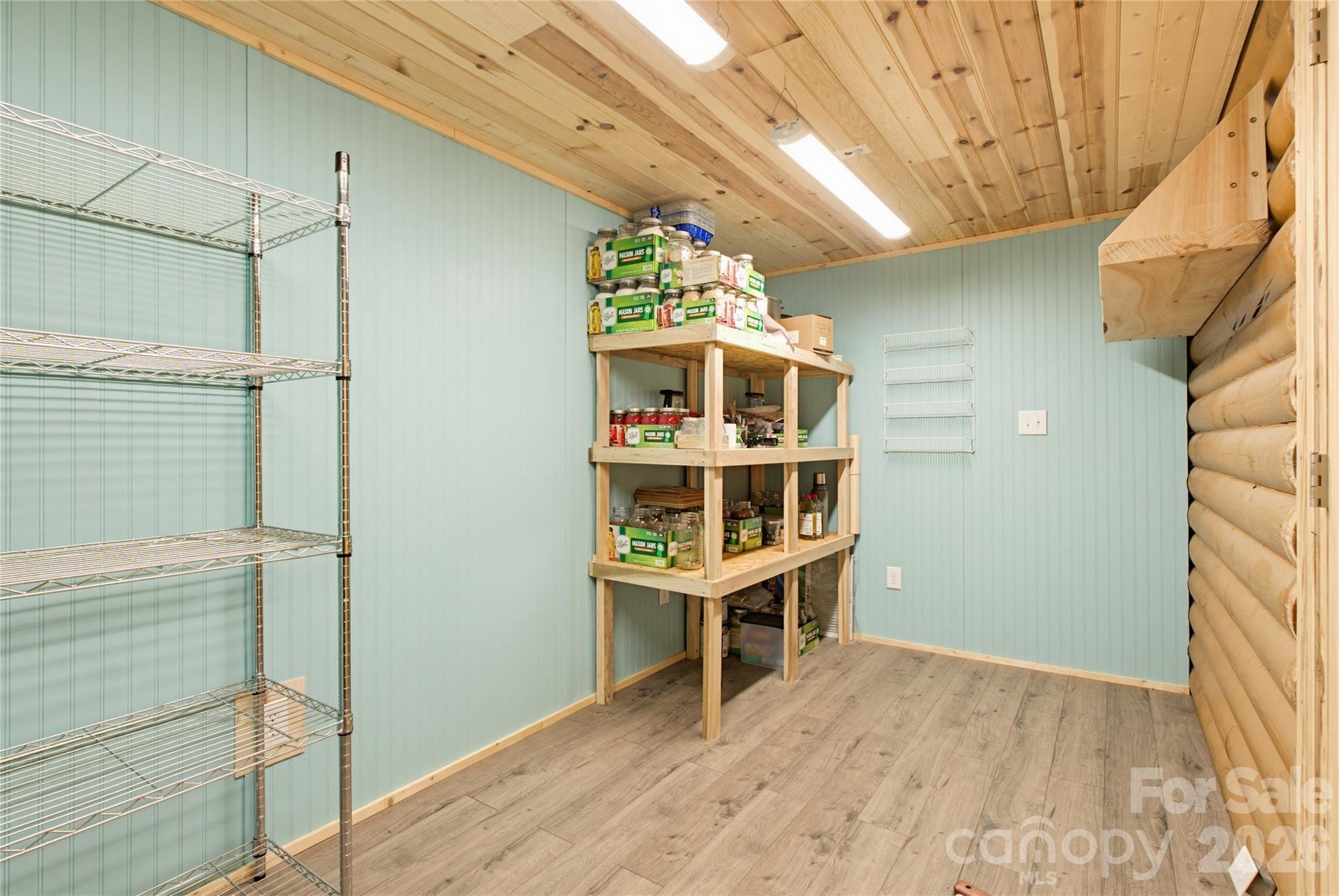 451 Rustic Ridge Drive Canton, NC 28716 - Photo 19 of 44 a view of a room with shelves