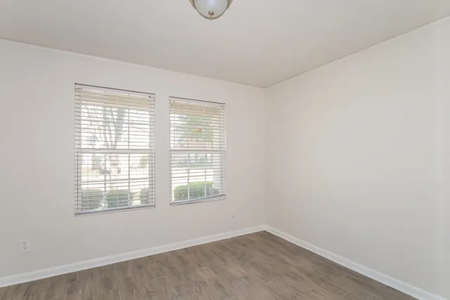 a kitchen with stainless steel appliances granite countertop a refrigerator sink and stove