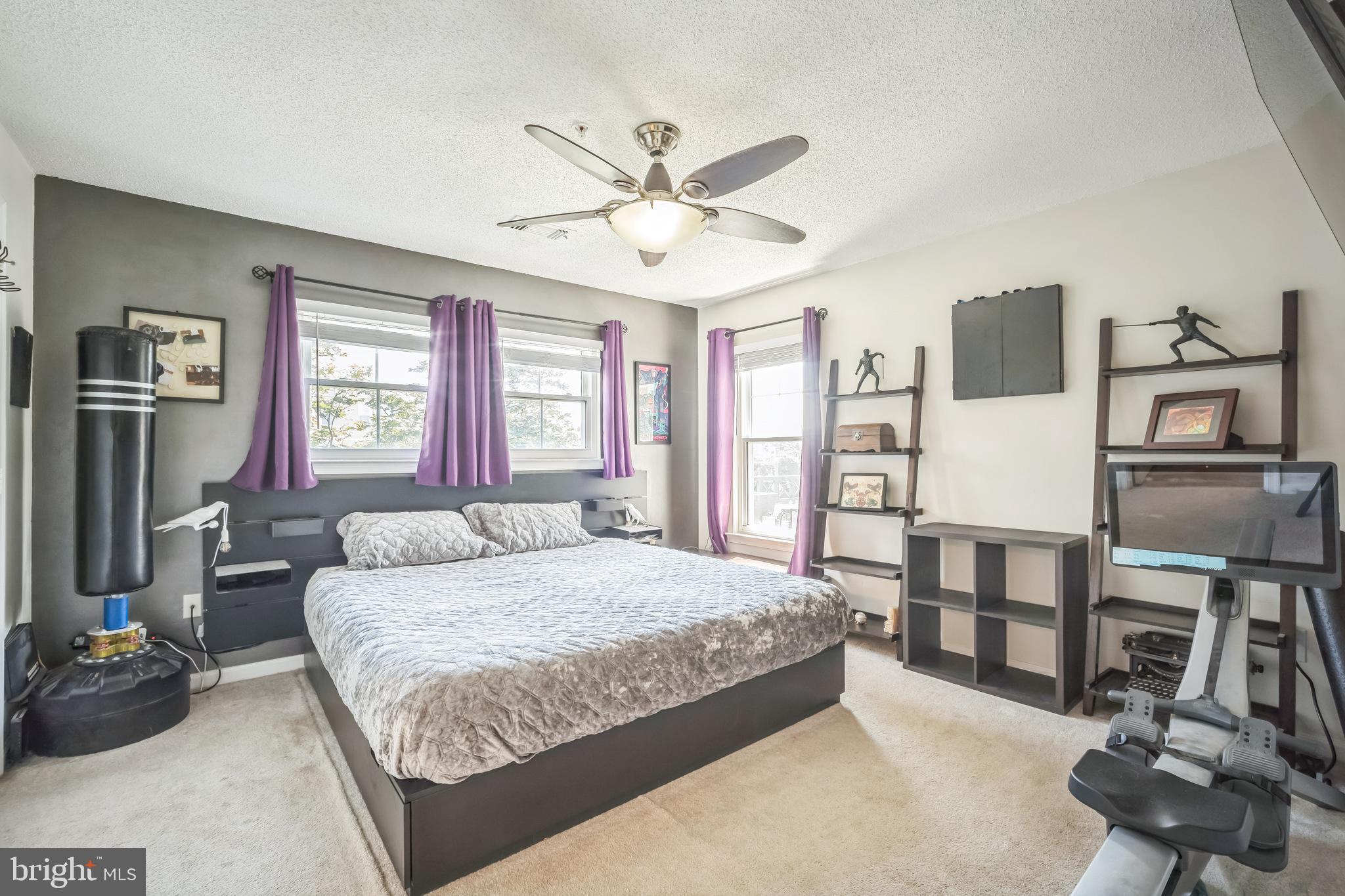 12013 Taliesin Place, Unit 33 Reston, VA 20190 - Photo 17 of 31 a bedroom with a bed furniture and a window