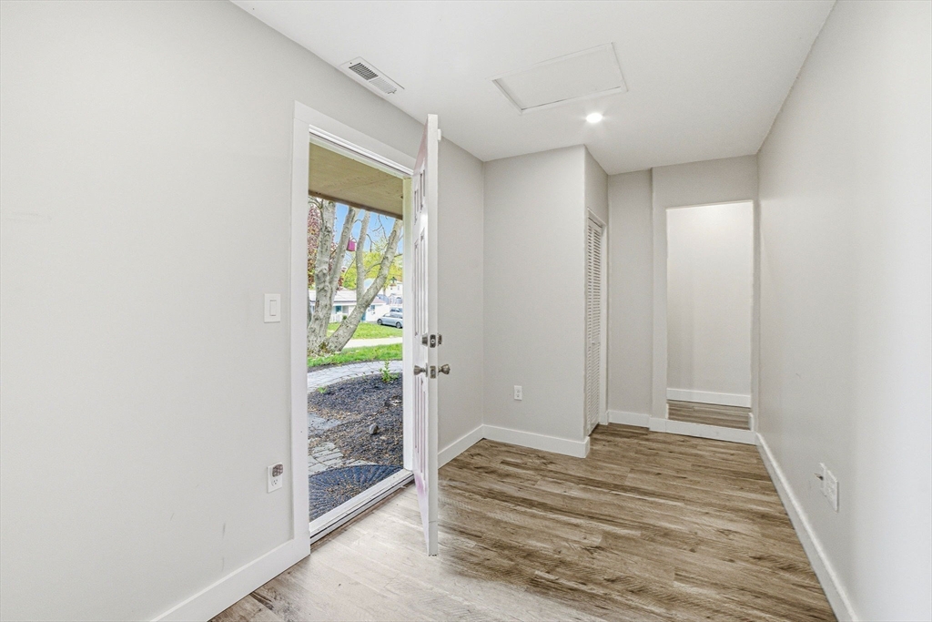 157 Errol Road Brockton, MA 02302 - Photo 29 of 34 a view of entryway with wooden floor