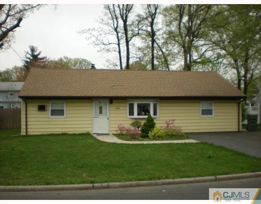 20 Crescent Road Edison, NJ 08817 - Photo 1 of 1 a view of a yard in front of a house with large windows