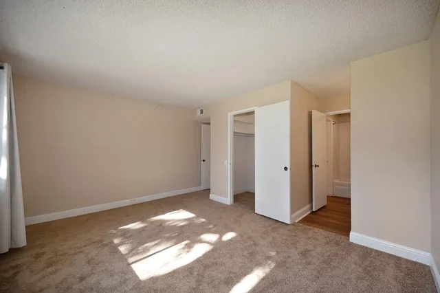 a bathroom with a sink double vanity and a mirror