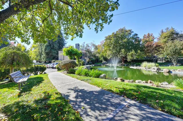a backyard of a house with lots of green space