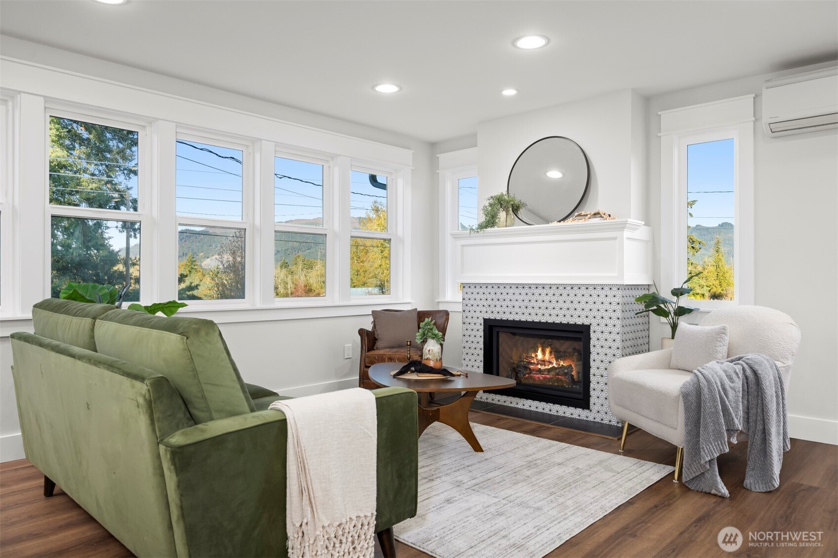 3505 East Smith Road Bellingham, WA 98226 - Photo 17 of 40 a living room with furniture and a fireplace