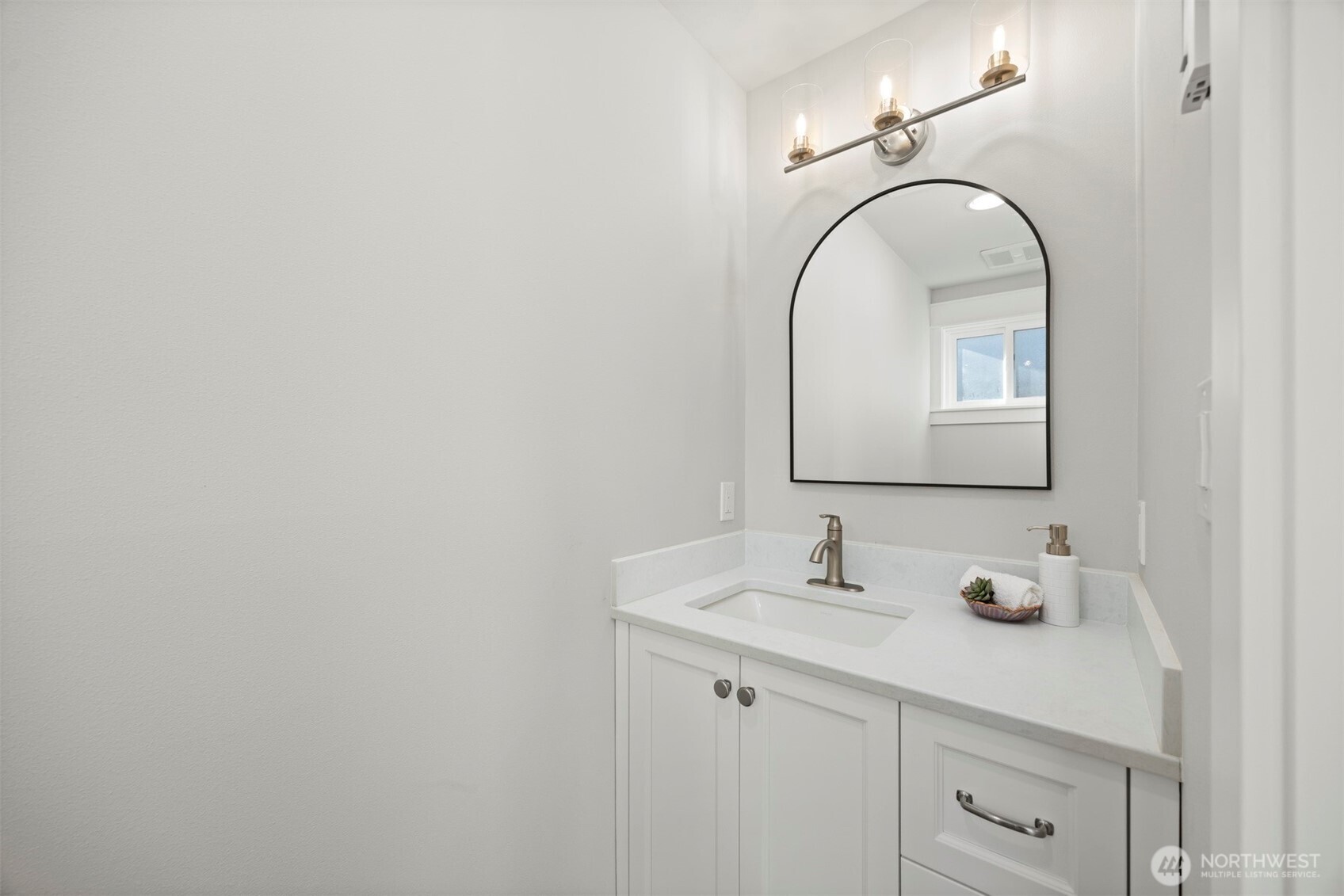 3505 East Smith Road Bellingham, WA 98226 - Photo 18 of 40 a bathroom with a sink and a mirror