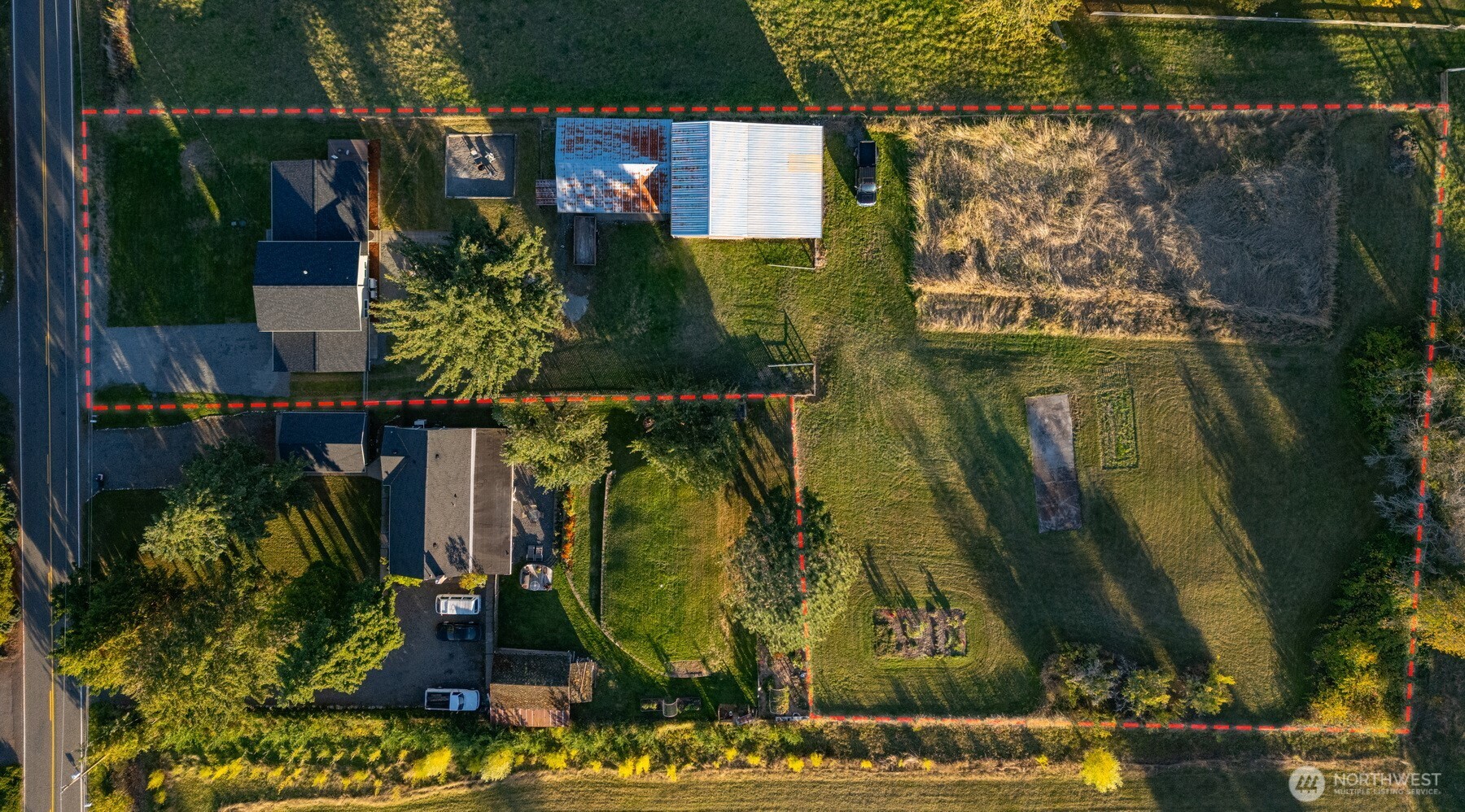 3505 East Smith Road Bellingham, WA 98226 - Photo 2 of 40 an aerial view of residential houses and car parked on street side
