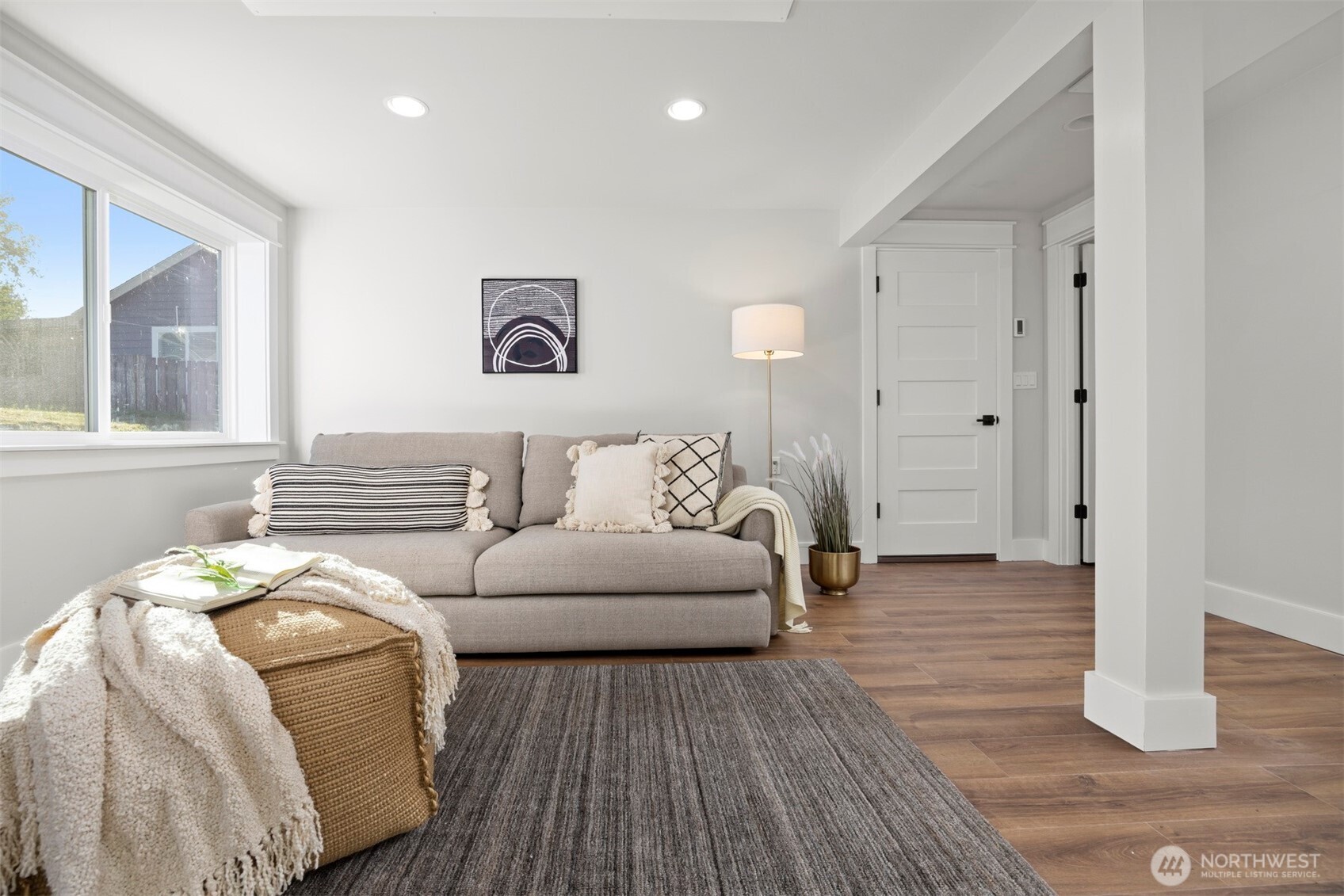 3505 East Smith Road Bellingham, WA 98226 - Photo 27 of 40 a living room with furniture and wooden floor