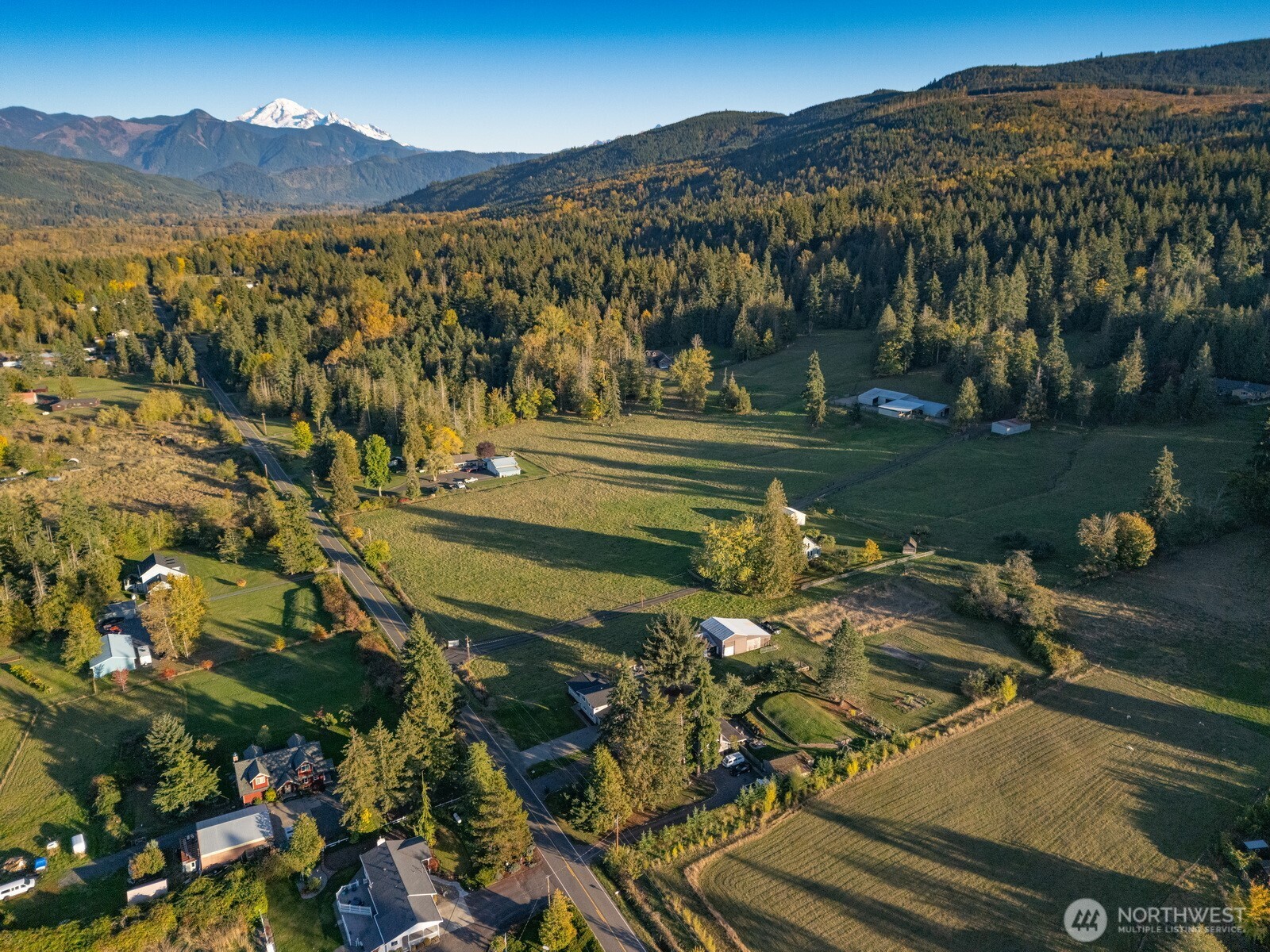 3505 East Smith Road Bellingham, WA 98226 - Photo 3 of 40 a view of a town with mountains in the background