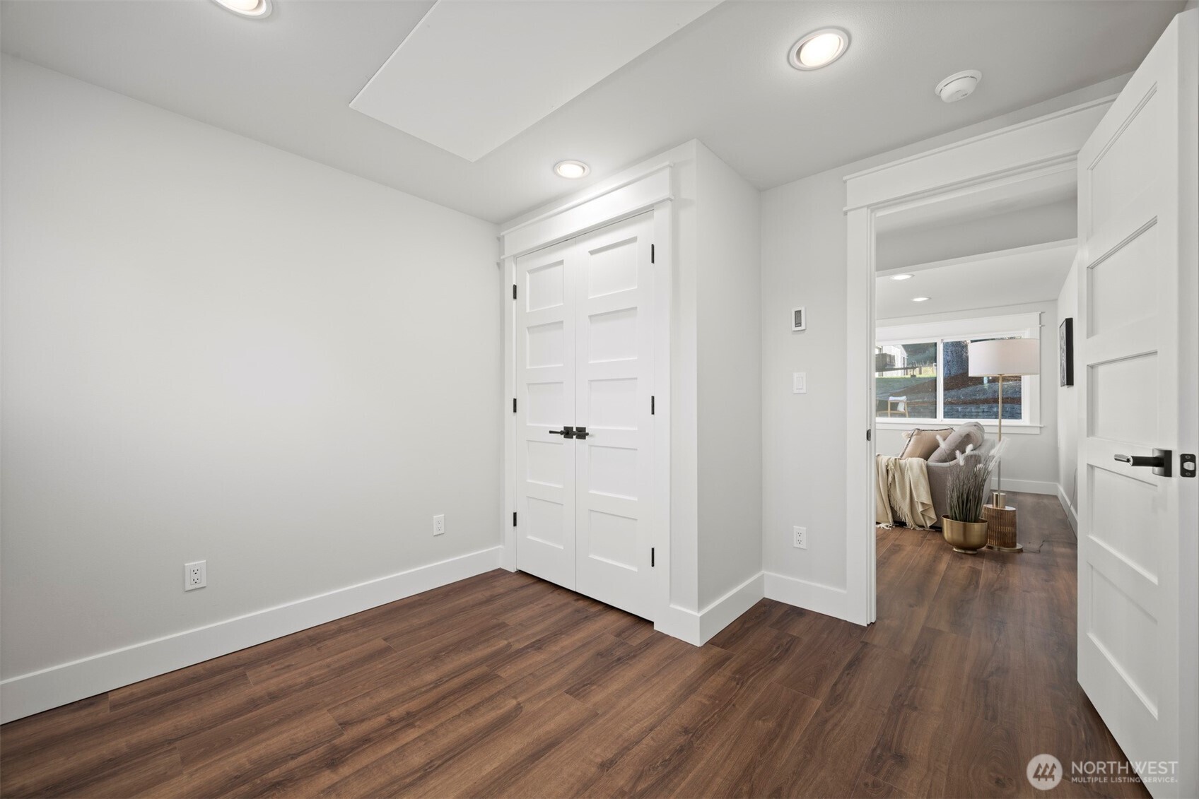 3505 East Smith Road Bellingham, WA 98226 - Photo 31 of 40 an empty room with wooden floor and furniture
