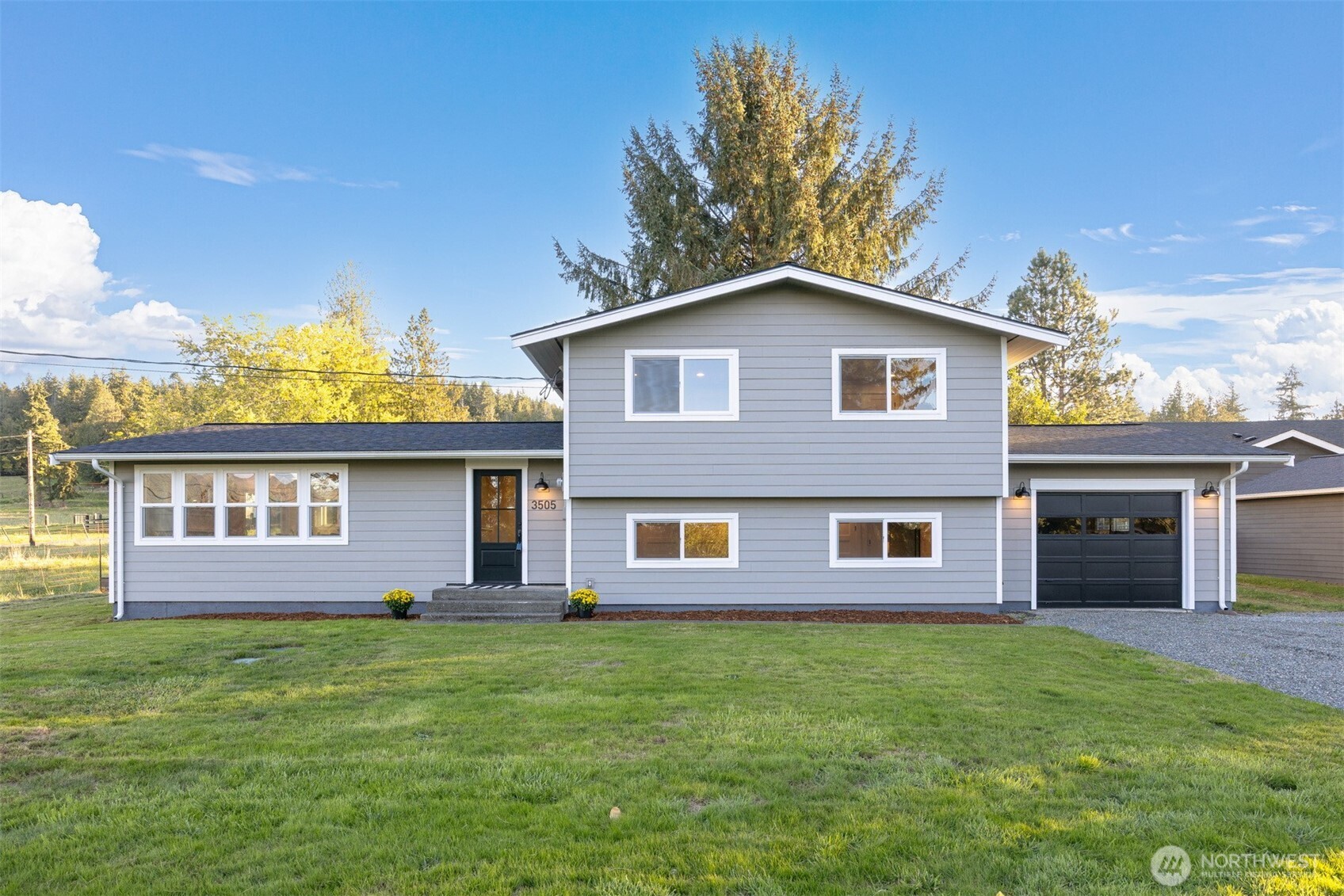 3505 East Smith Road Bellingham, WA 98226 - Photo 40 of 40 a front view of a house with garden