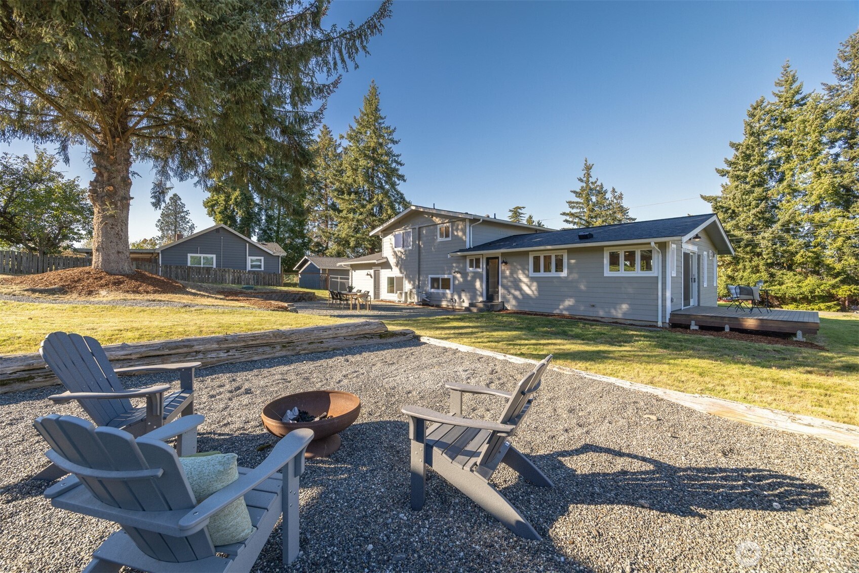3505 East Smith Road Bellingham, WA 98226 - Photo 5 of 40 a view of a swimming pool with a lounge chairs