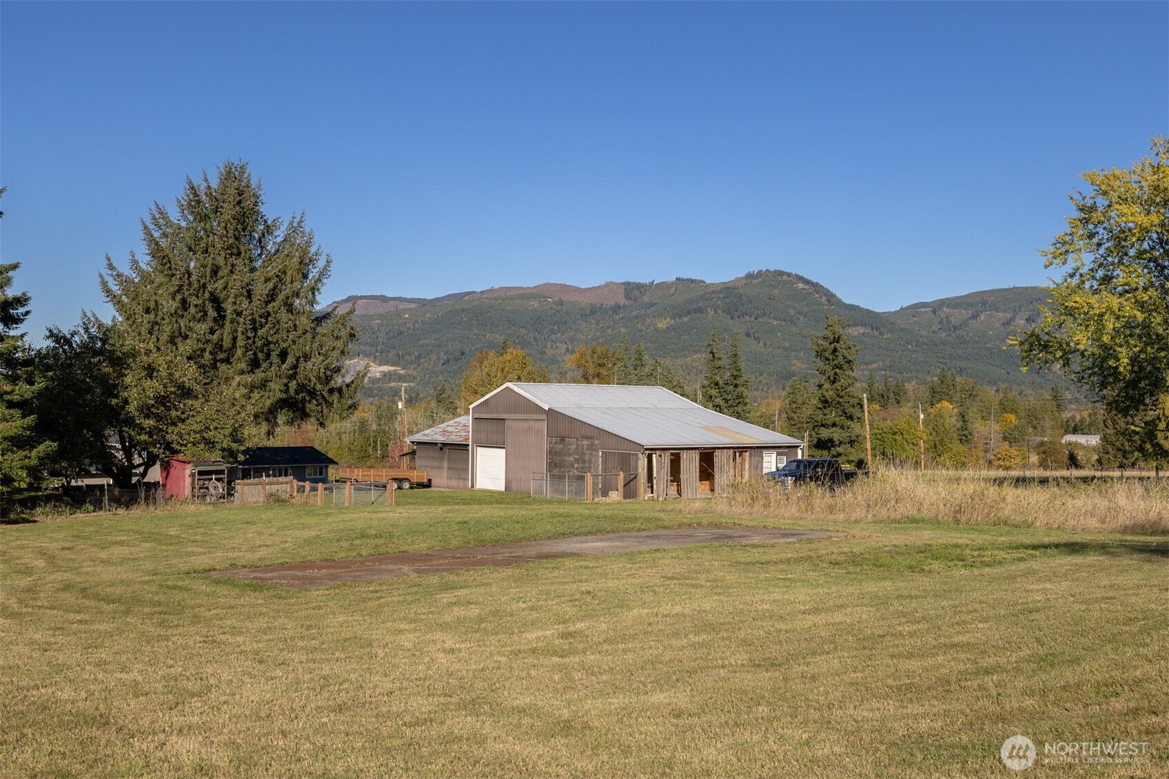 3505 East Smith Road Bellingham, WA 98226 - Photo 7 of 40 a view of a lake with a mountain in the background