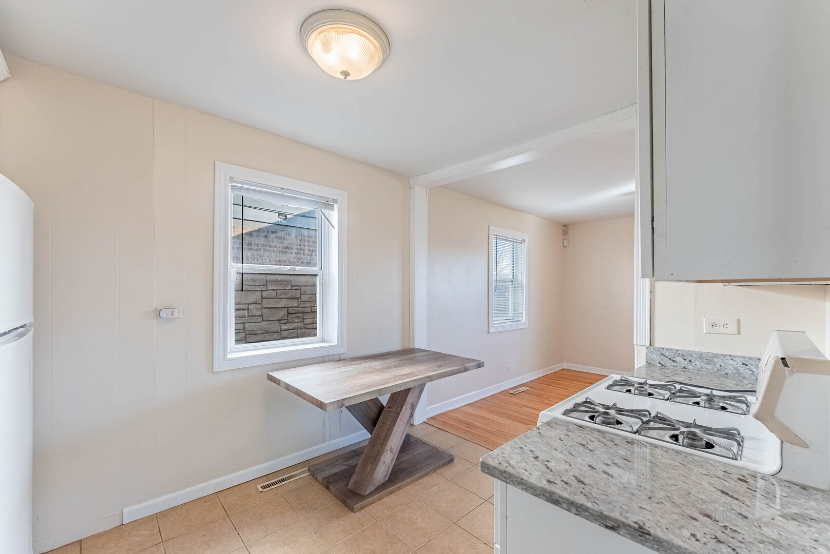 16154 Honore Avenue Markham, IL 60428 - Photo 14 of 32 a living room with furniture and a window