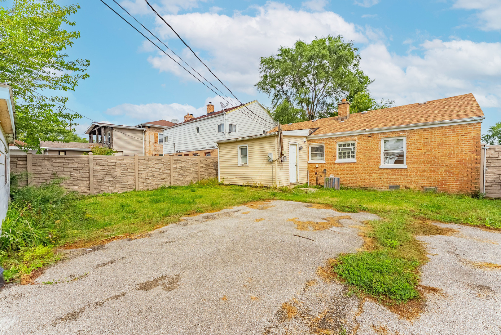 16154 Honore Avenue Markham, IL 60428 - Photo 28 of 32 a front view of a house with a yard and a garage