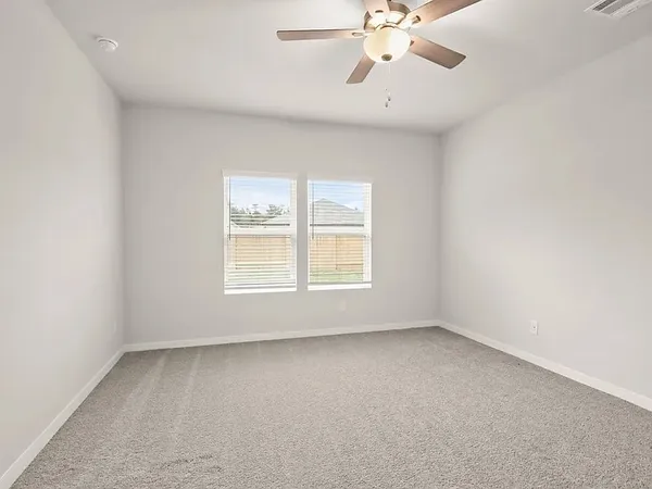 a large kitchen with kitchen island a sink stainless steel appliances and cabinets