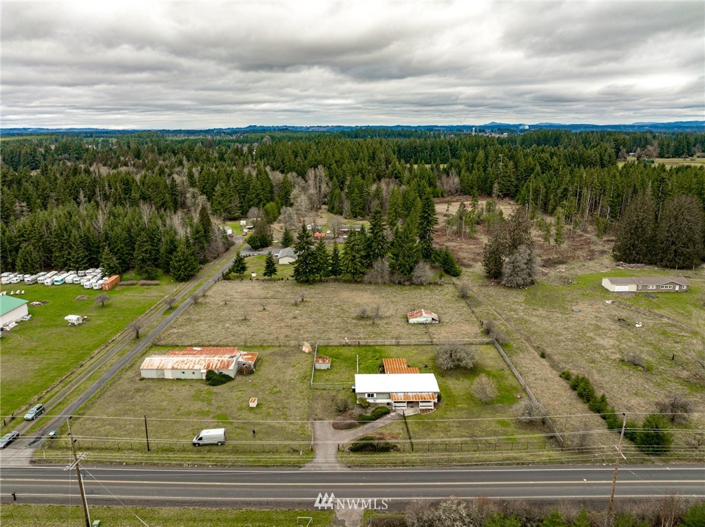 484 West Avery Road Winlock, WA 98596 - Photo 36 of 39 a view of a swimming pool and a yard