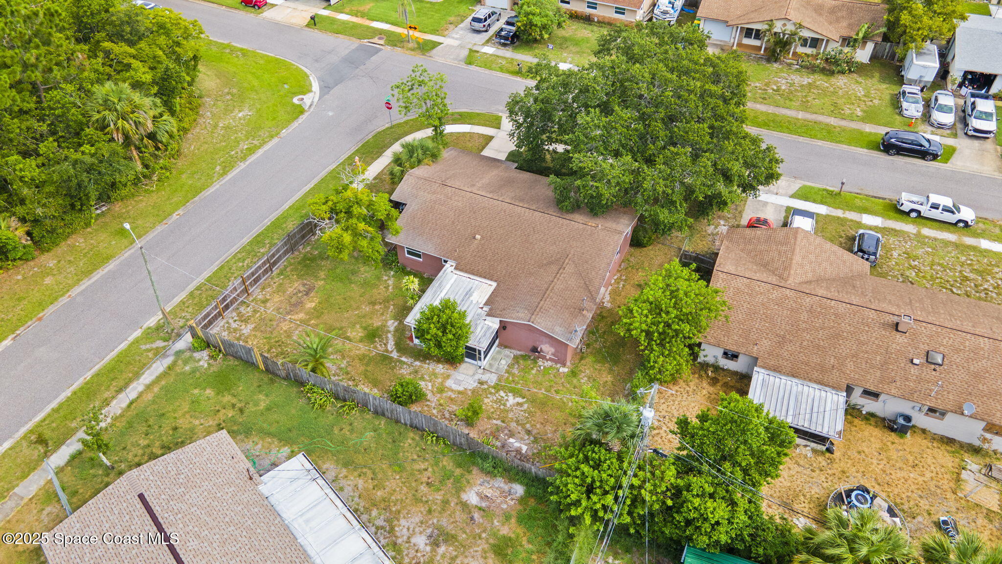 959 Macco Road Cocoa, FL 32927 - Photo 31 of 34 an aerial view of a house with a yard