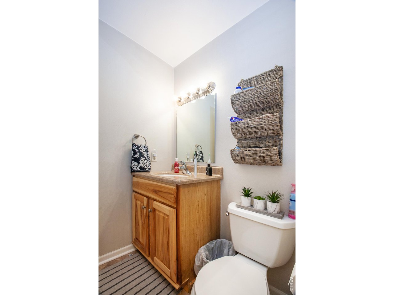 3400 Stanford Road, Unit 111 Fort Collins, CO 80525 - Photo 12 of 30 #2 Jack-n-Jill Bath Vanity/Stool from Entry door