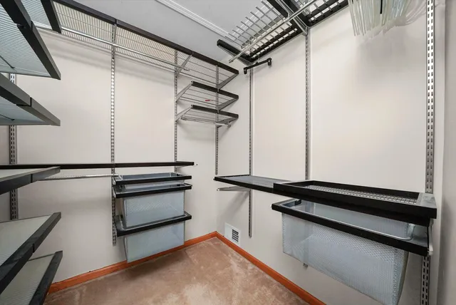 a view of a room with racks on the wall