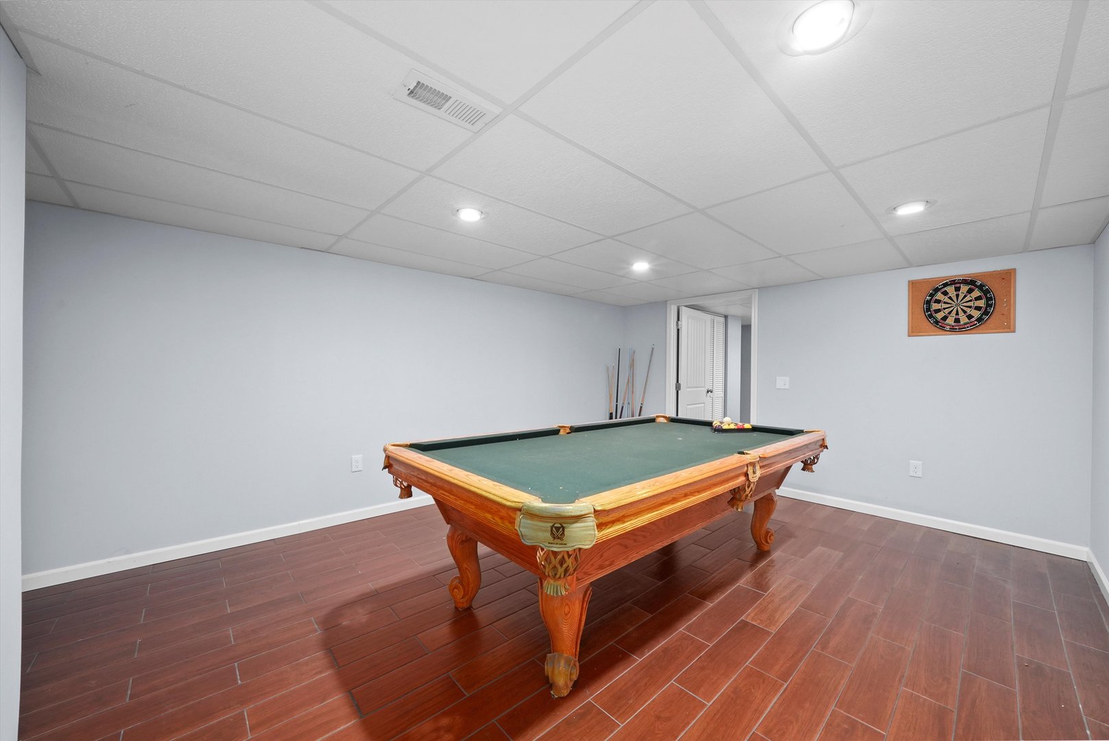 497 Pheasant Chase Drive Bolingbrook, IL 60490 - Photo 20 of 33 a room with wooden floor and pool table