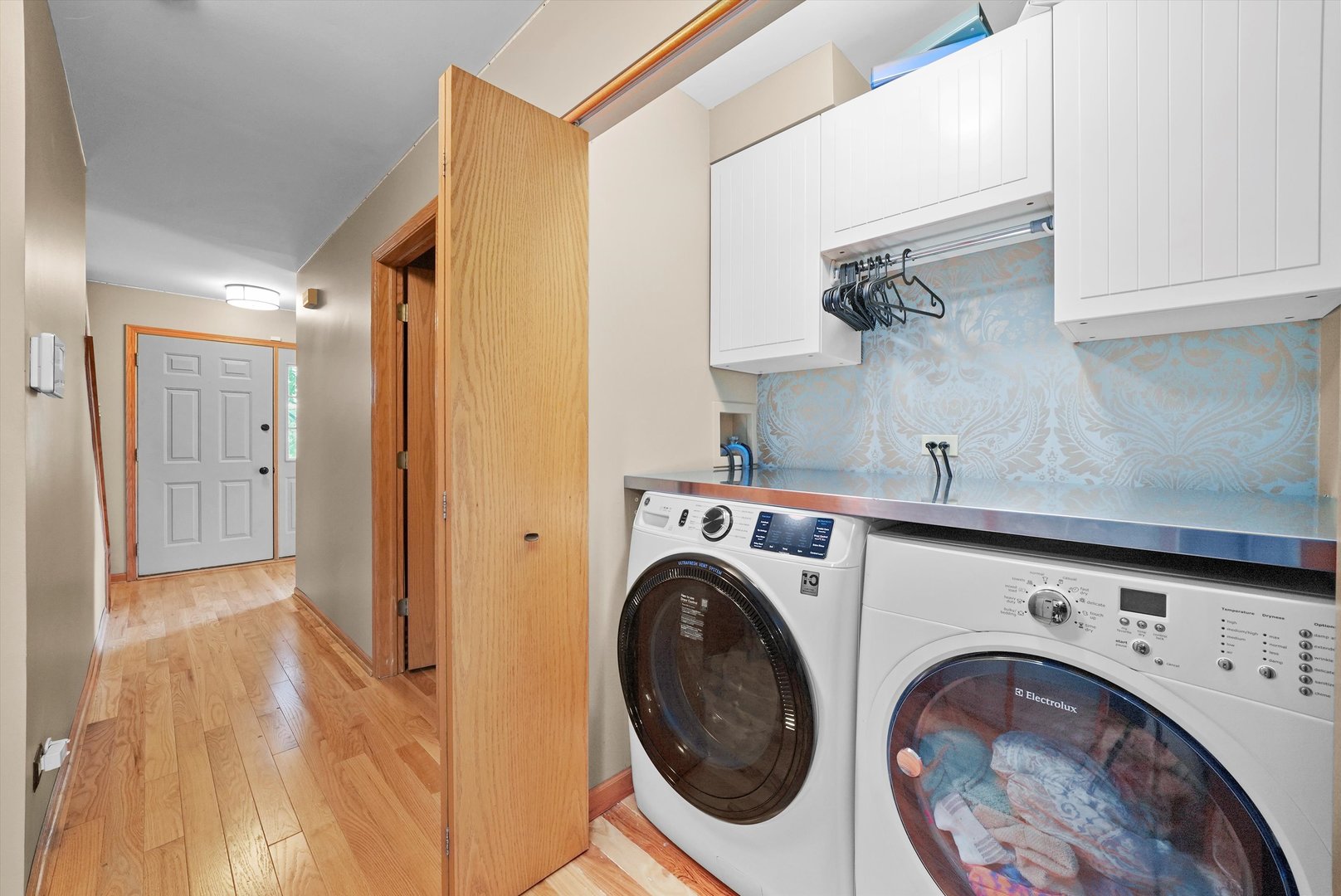 497 Pheasant Chase Drive Bolingbrook, IL 60490 - Photo 10 of 33 a view of a hallway with washer and dryer