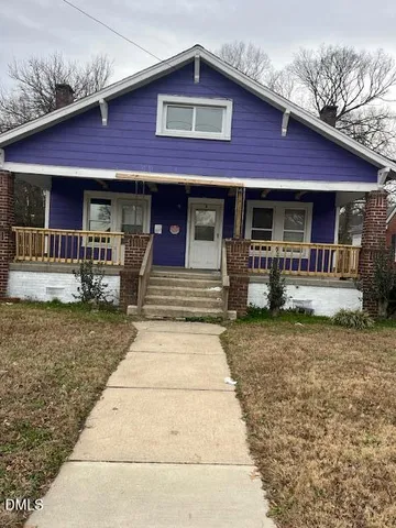 a front view of a house with patio
