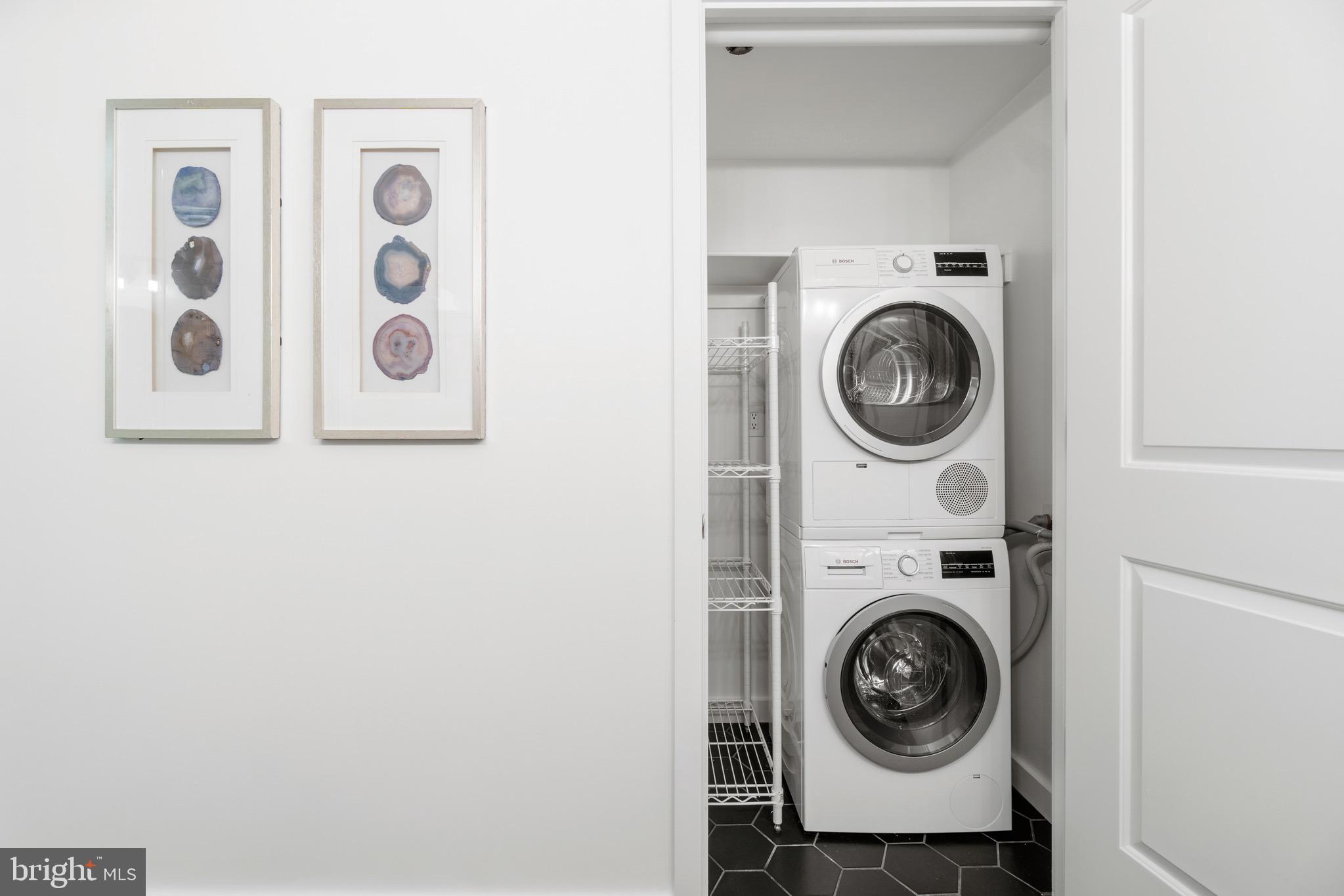 1025 First Street Southeast, Unit 1010 Washington, DC 20003 - Photo 22 of 36 a utility room with dryer and washer