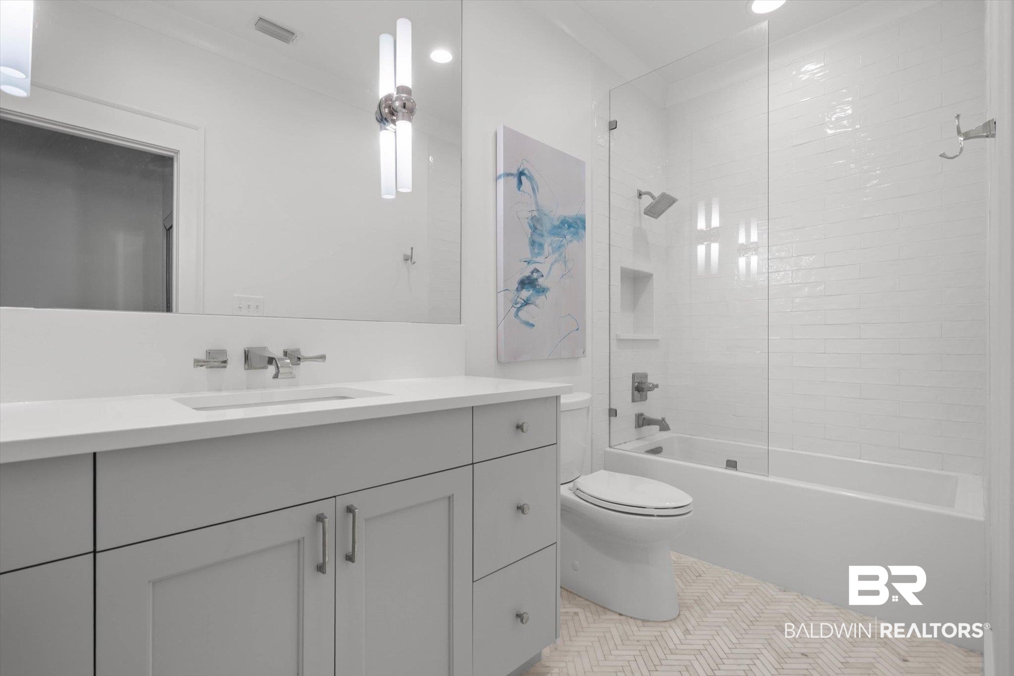 4602 Kingswood Drive Mobile, AL 36608 - Photo 31 of 45 Bathroom featuring vanity, bathtub / shower combination, and light tile patterned floors