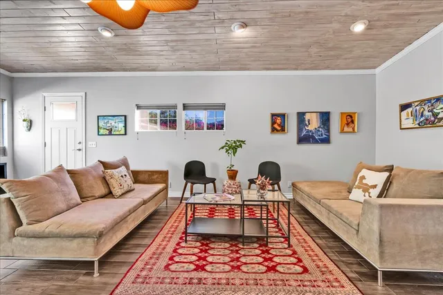 a kitchen with sink stove and window