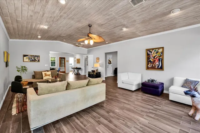 a kitchen with stainless steel appliances granite countertop a stove and a sink