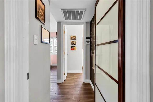 a view of a patio with a table and chairs
