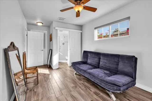 an aerial view of residential building and ocean
