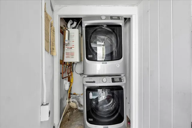 an aerial view of residential house and sandy dunes